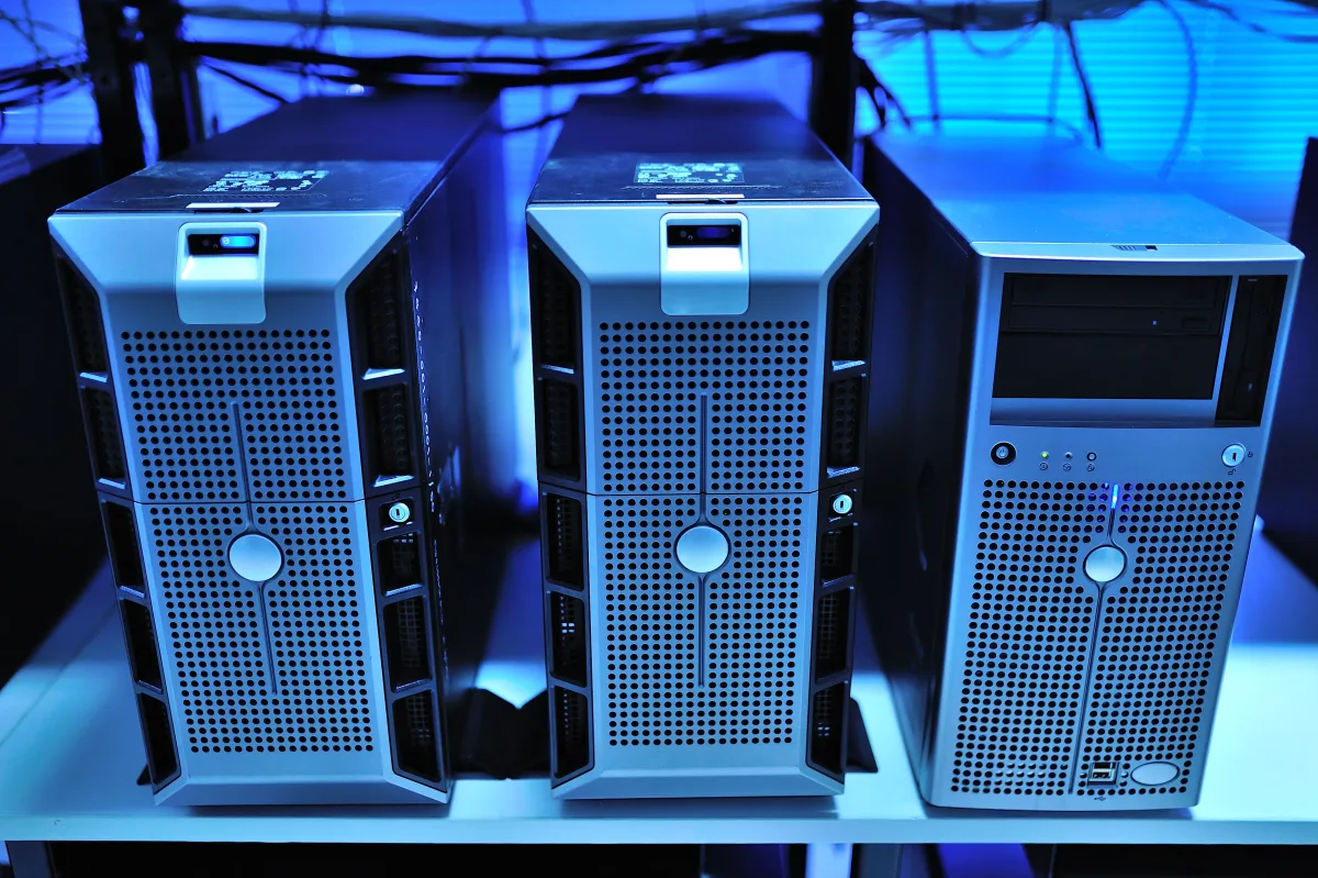 Three server towers used to illustrate web hosting infrastructure.